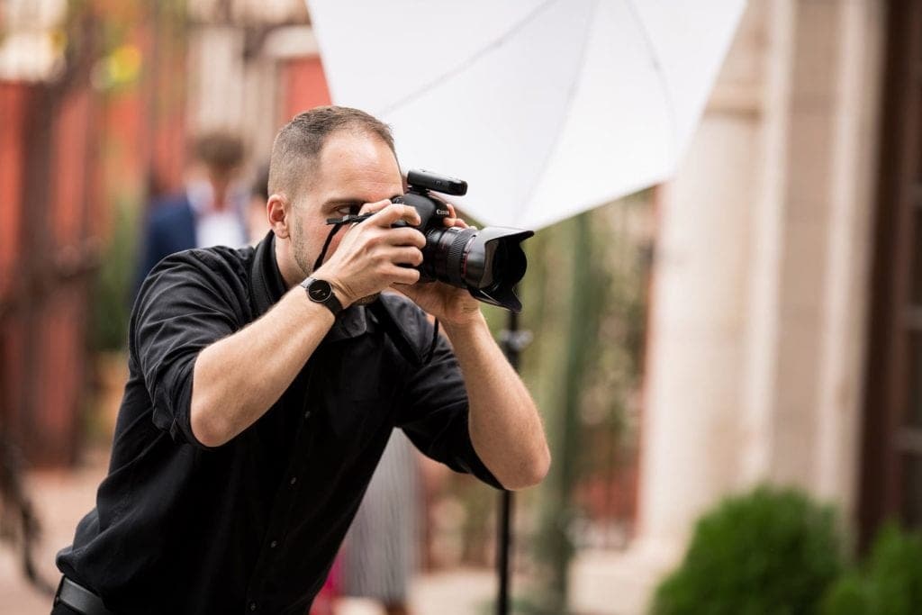 Tavit photographing a corporate event
